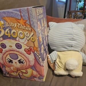 Striped Blue and White Plush Toy